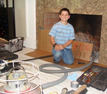 NortheastChimneySweeps.com Unlined Flue Woburn Ma Flue Liners Caps Pointing Repairs Chimney man